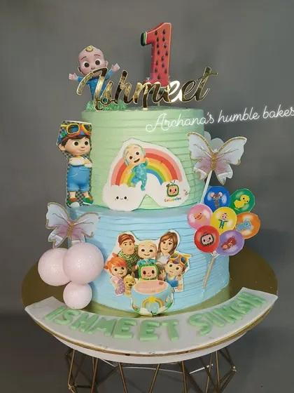 A closer look at Ishmeet's two-tier Cocomelon birthday cake.