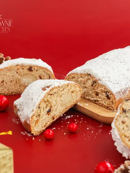 Our Christmas Stollen Bread is a festive German classic. This fruit-filled loaf is enriched with spices and marzipan, then dusted with powdered sugar for a snowy finish.
