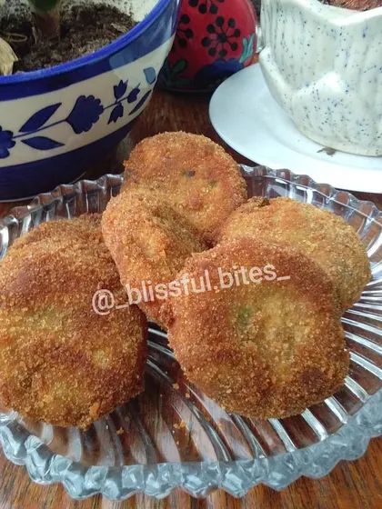 Freshly made Malai Kebabs, showcasing their perfectly crisp exterior. These are a wonderful addition to any snack platter.