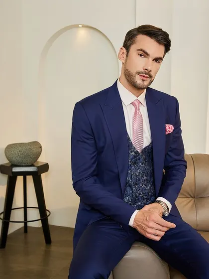 The complete look of my blue ceremonial suit, showcasing its elegant drape and impeccable fit. This ensemble is crafted for formal events where making a lasting impression is key, from a wedding reception to a corporate gala.