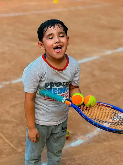 The happy, tired face of a young player after a good training session. This is the look of hard work and satisfaction.
