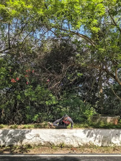 Ashtavakrasana (Eight-Angle Pose) on a roadside ledge. Finding opportunities to practice in unexpected places keeps the journey interesting and reminds me that yoga can be done anywhere.