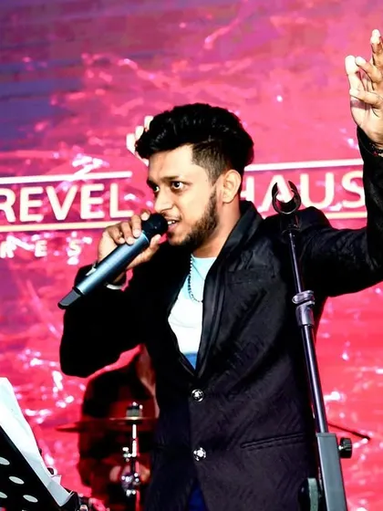A shot from our show at Revel Haus. This captures the energy of a live performance, where I engage with the audience while the band lays down a solid groove.