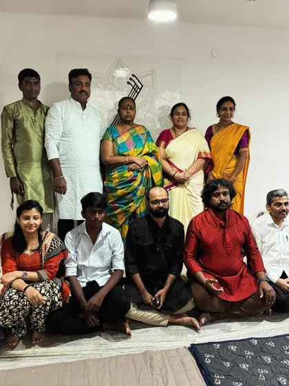 A group photo with some of my students and their family members after our Saraswati Pooja.