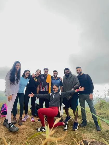 The whole group posing at the summit. Reaching the top together is a great feeling, and we always take a moment to celebrate.