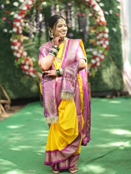 A joyful, candid moment captured. Her smile says it all. The makeup is designed to withstand happy tears and endless smiles, keeping her looking fresh and radiant throughout the celebration.