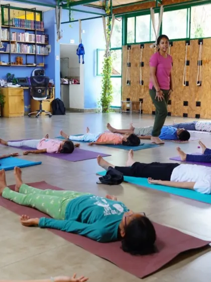 The children practicing Savasana (Corpse Pose) at the end of their class. Even at a young age, they learn the importance of relaxation and stillness.