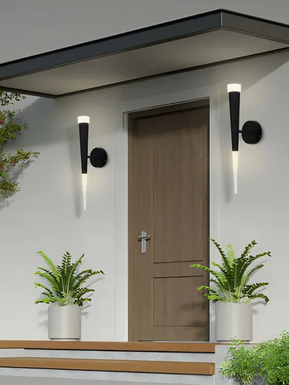 A modern torch-style wall sconce, perfect for flanking a doorway or a piece of art. The design is sleek and contemporary.