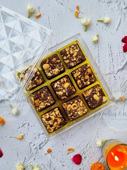 A simple and elegant Diwali gift box. This clear acrylic box contains nine pieces of my nutty chocolate brownies, perfect for corporate or personal gifting.