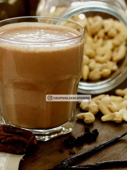 This is our rich Dry Fruit Milkshake, blended with cashews, dates, and other nuts. It's a wholesome and energy-boosting beverage option for any event.
