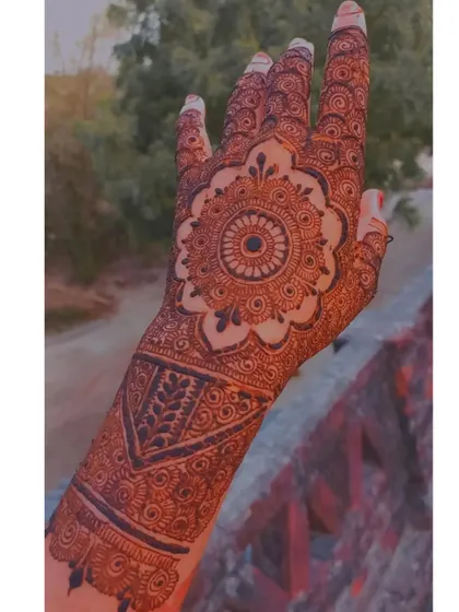 A full-hand mandala design, a classic and timeless choice for any occasion.