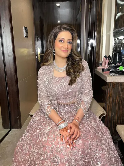 A still from the no-filter video, showing the beautiful, radiant finish of her makeup under event lighting.