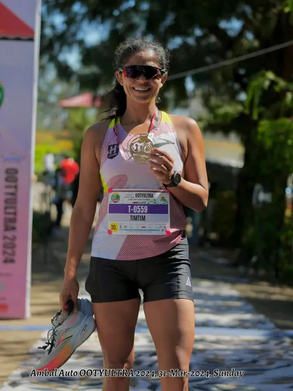 Holding my Ooty Ultra medal. This one feels special after setting a new course record on such a challenging route.