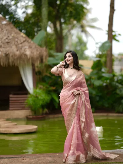 A final look at the pink tissue silk saree, a testament to classic style and modern femininity.