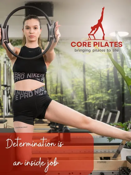 Determination is an inside job. A client holds the magic circle with focus, preparing to engage her upper body and core on the Reformer.