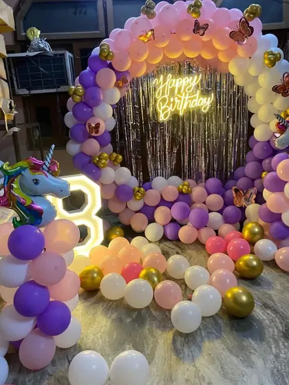 A unicorn and butterfly theme for an 8th birthday, combining two magical elements in one beautiful ring setup.
