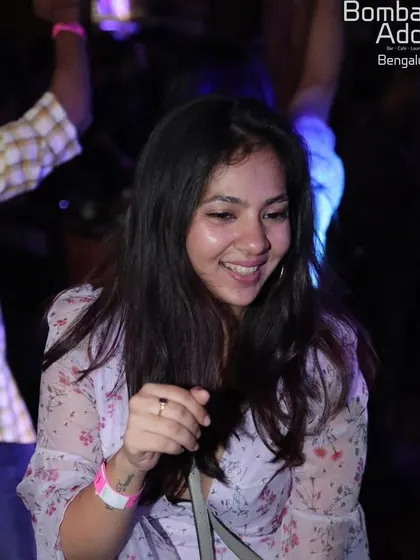 A duplicate of the woman with the sweet smile. Her gentle enjoyment is just as powerful as wild dancing.