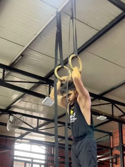 Working on the false grip, a critical component for many advanced ring movements.