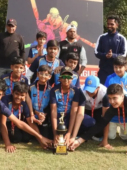 The team celebrating their journey to the final. The spirit and unity of the team are just as important as the result.