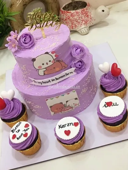 A super cute Bubu-Dudu themed cake ordered by a bride for her groom's birthday, which was also their wedding day. This two-tier lavender cake was accompanied by five matching cupcakes with personalized messages.