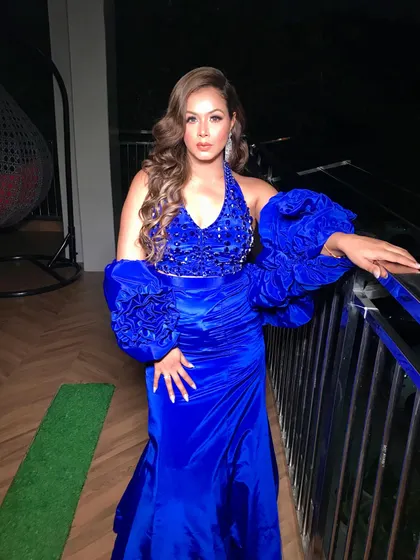 Feeling the blues in the best way possible with this dramatic blue gown for a cocktail event.