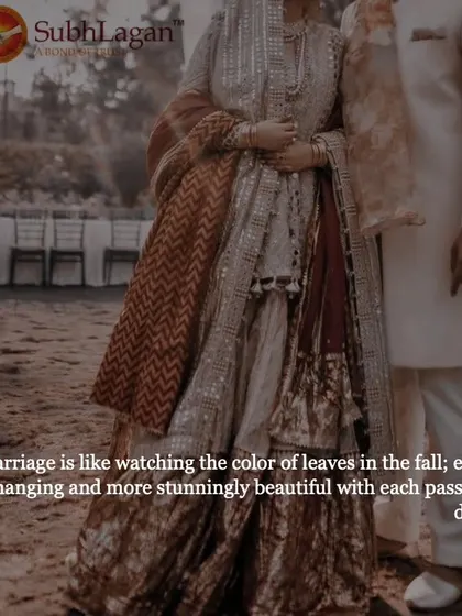 A couple stands together in beautiful, coordinated outfits. We believe marriage is ever-changing and grows more beautiful with each passing day, just like the seasons.