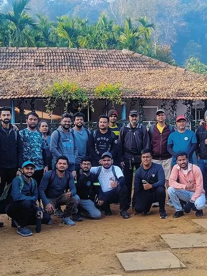 A group photo outside a rustic homestay, the starting point for many of our Western Ghats adventures. The journey of a thousand miles begins here.