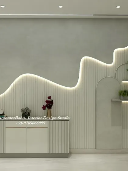 A minimalist console area with a feature wall that has an organic, flowing design highlighted by profile lighting. This shows how simple shapes and lights can create a dramatic effect.