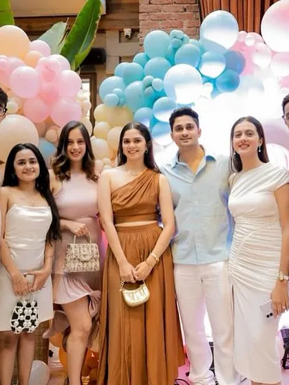More happy guests celebrating with the couple. It's all about creating a warm, joyful environment.