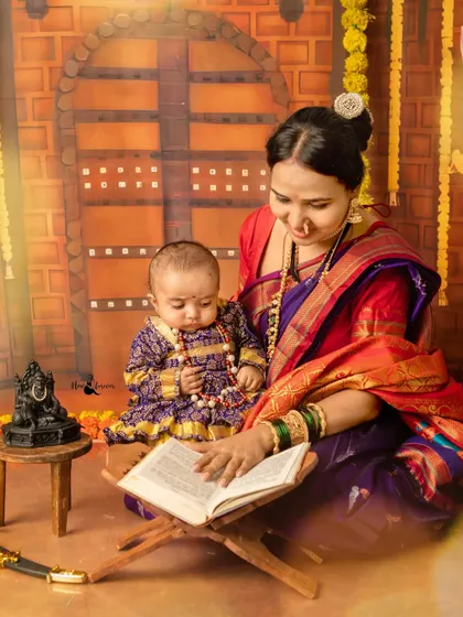 A beautiful moment between mother and child during our Shivaji Maharaj Jayanti session. Here, she reads stories of bravery to her little 'Shivba'.