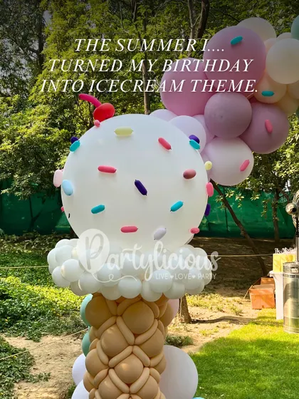 The summer I... turned my birthday into an ice cream theme. A close-up of a giant ice cream cone balloon sculpture.