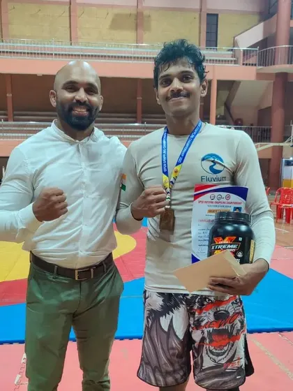 Receiving my gold medal and prize money. Thankful for my corner and supplement sponsors.