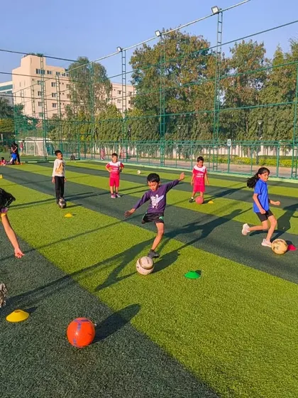 This one picture captures it all! Kids of different ages and skill levels coming together on the turf to learn, play, and grow with our football programs.