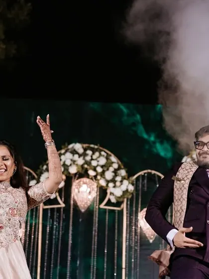 The joyous expressions and radiant smiles say everything. We love capturing these happy moments as families celebrate together on the dance floor.