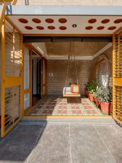 The entrance to the swing room from the open terrace.