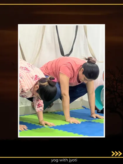 A partner-assisted Crow Pose, where one student helps the other find the correct alignment and lift.