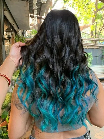 A close-up of the turquoise dip dye. The color is so vibrant against the dark hair. (No filter)