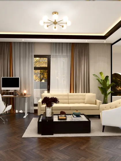 The rich herringbone pattern of the dark wood floor provides a grounding element in this light-filled living room. Our cream-colored sofa and white armchair offer a soft contrast, creating a balanced composition of light and dark, texture and smoothness.