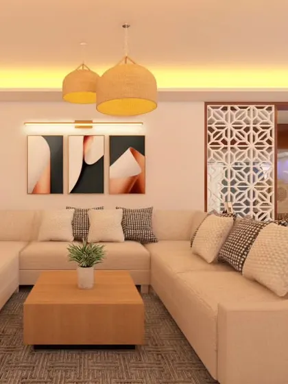 A cozy living room setup featuring a neutral-toned sofa, abstract wall art, and warm ambient lighting. The space is designed to feel comfortable and inviting, perfect for everyday relaxation.