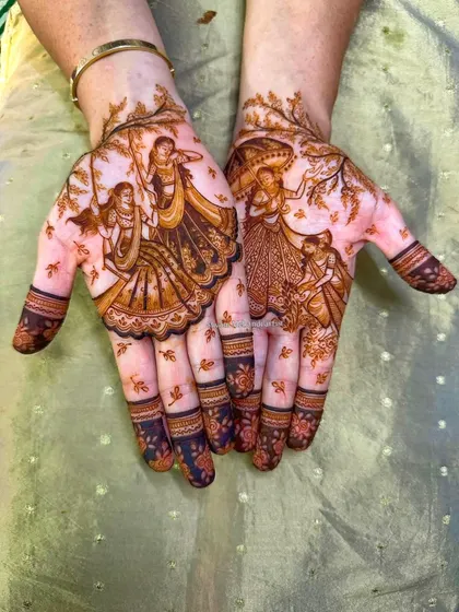 The completed Hariyali Teej design with a beautiful dark stain, showing the festive scene in stunning detail.