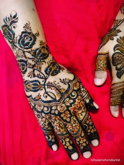 Another shot of the trending dark rose design, showing the full pattern on the back of the hand.