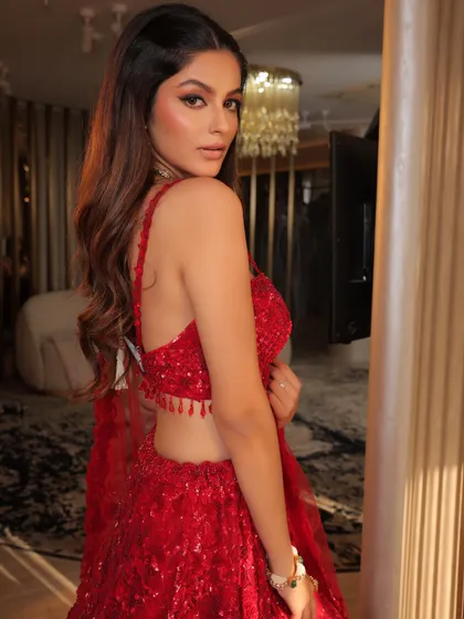 A side profile from the Alaya Collection shoot. The soft waves of the hair and the glowing makeup create a romantic and glamorous feel, perfect for bridal advertising.