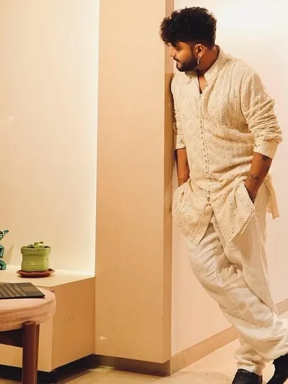Another shot from the SoMan Menswear campaign. The relaxed fit and intricate detailing make it a standout piece for any modern man's wardrobe.