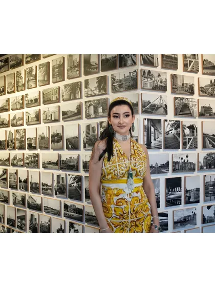 The full look against a wall of art. Styling for an art collector means the fashion has to be a work of art in itself.