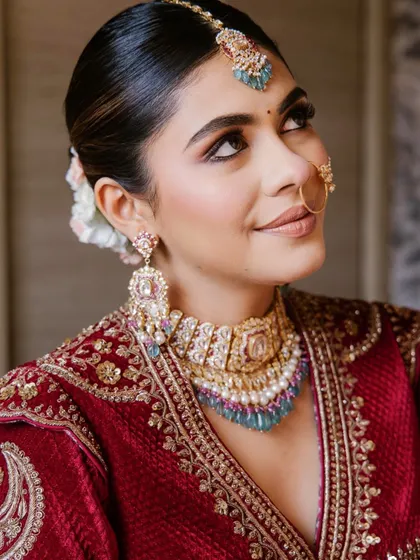 A close-up of the royal wedding look. Notice the soft, upward-swept eye makeup that lifts and defines the eyes.