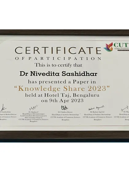 A close-up of my certificate for presenting a paper at the "Knowledge Share 2023" event, a testament to my active involvement in the academic side of dermatology.
