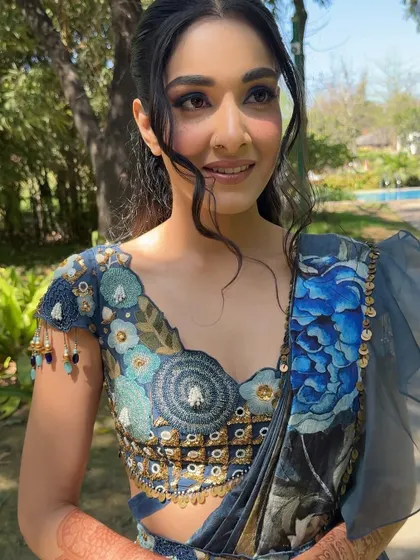 This close up shows the soft glam created for an outdoor event. I used a gentle smokey eye and a glossy nude lip, paired with a relaxed hairstyle, to craft a look that is both elegant and perfect for a daytime celebration.