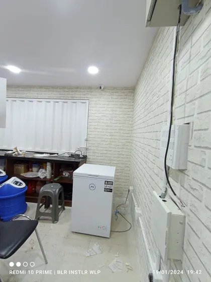 Another view of the white brick wallpaper in the kitchen.