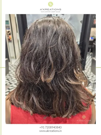 The "after" shot of our cozy brown highlights, showing a complete transformation with beautiful, warm tones.