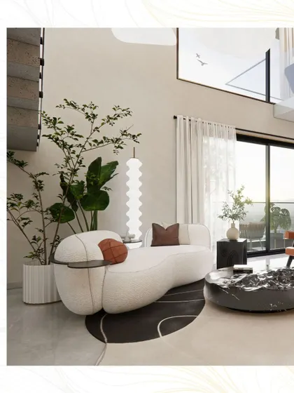 A sculptural, free-form sofa provides a soft, organic counterpoint to the clean, architectural lines of the penthouse.